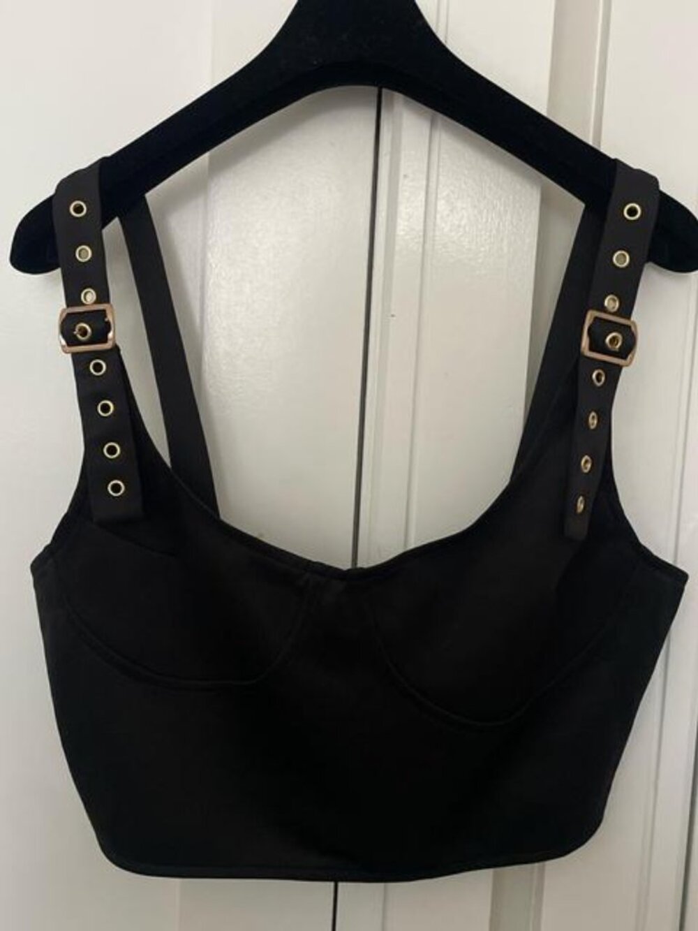 Black bralette with gold buckles